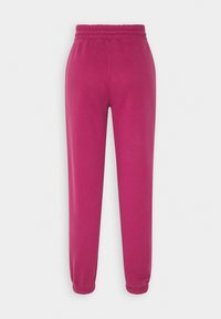 Fuchsia joggingbroek met een elastische tailleband, taps toelopende boorden en een gladde textuur. Eenvoudig ontwerp zonder zakken of versieringen.