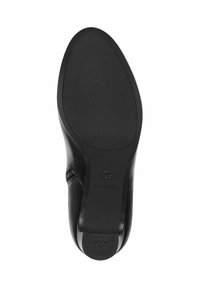 Chaussure en cuir noir avec une semelle en caoutchouc texturée et une fermeture éclair latérale. Taille 37 marquée sur la semelle, présentant un design de bout arrondi et contourné.