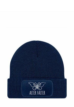 Navy blue knitted beanie with a cuff; features a rectangular patch with a butterfly graphic and the text "ALTER FALTER" in white.