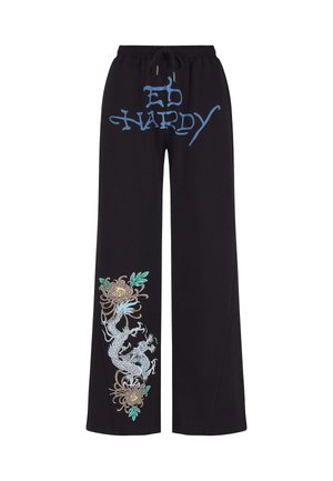 Zwarte sweatpants met een elastische tailleband en trekkoord, voorzien van blauwe "Ed Hardy" tekst en een ingewikkeld ontwerp van een draak en bloemen op één been.