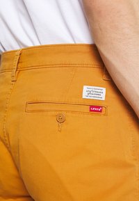 Levi's® Calções - yellows/oranges