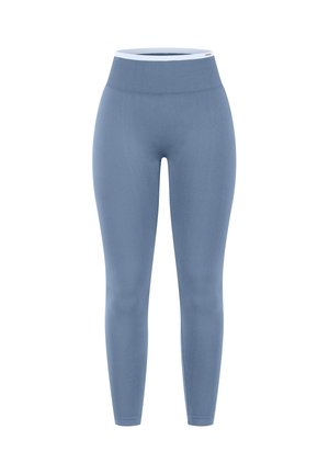 Blauwe, naadloze leggings met hoge taille en een brede geribde tailleband met witte bies op een effen witte achtergrond.