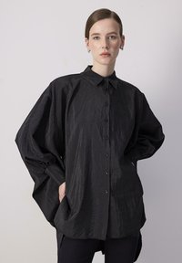 BAT SLEEVE CUPRA - Button-down blouse - black