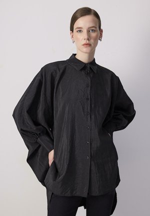 Touché Privé BAT SLEEVE CUPRA - Button-down blouse - black