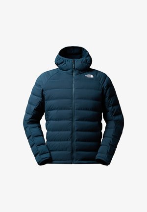 Dark blue puffer jacket with a high collar and zippered front. Features quilted pattern and a logo on the left shoulder. Smooth texture.