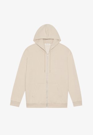 Bežna zip-up kapuca iz mehkega bombažnega materiala, z žepom za kangurja spredaj, kapuco z vrvico ter rebrastimi manšetami in robom.