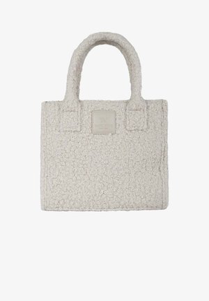 Borsa crema testurizzata in morbido tessuto bouclé. Presenta due manici robusti e una forma rettangolare con una piccola etichetta del marchio.