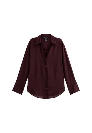 Bordeaux lange mouw shirt van lichtgewicht stof met een subtiel stippenpatroon, met een kraag en knoopsluiting.