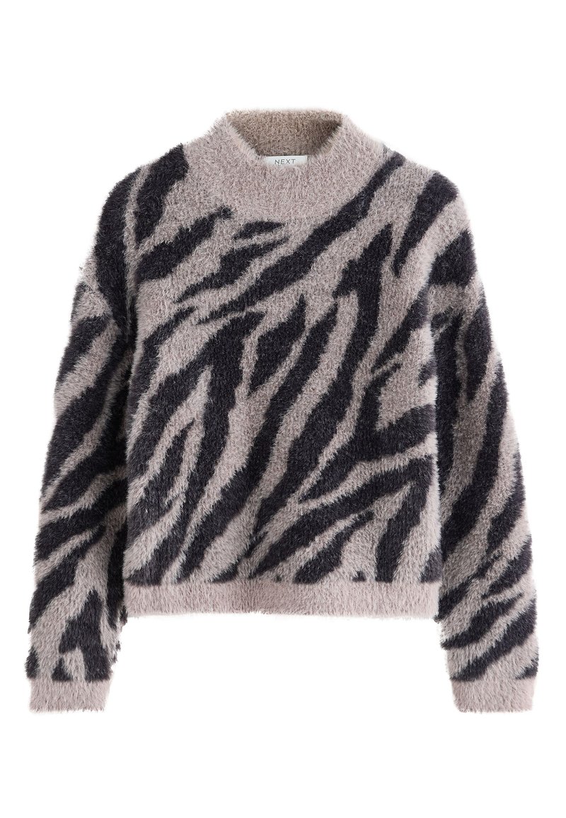 Fuzzy sweater in light beige with black tiger stripes, featuring a round neckline and long sleeves, made from soft, textured fabric.