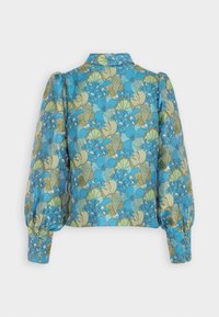 Blouse à imprimé floral bleu avec des manches bouffantes, dotée d'un col et depoignets boutonnés, fabriquée dans un tissu lisse et léger.