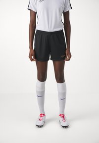 Nike Performance SHORT BRANDED - Športové šortky - black/metallic gold