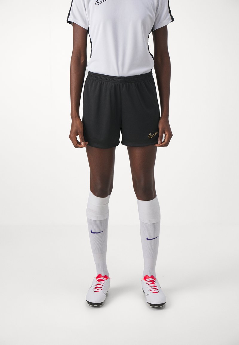 Nike Performance SHORT BRANDED - Športové šortky - black/metallic gold
