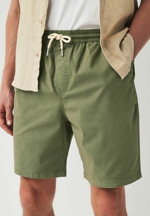 REGULAR FIT - Tracksuit bottoms - khaki green