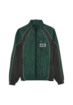 Overgangsjakke - garden topiary