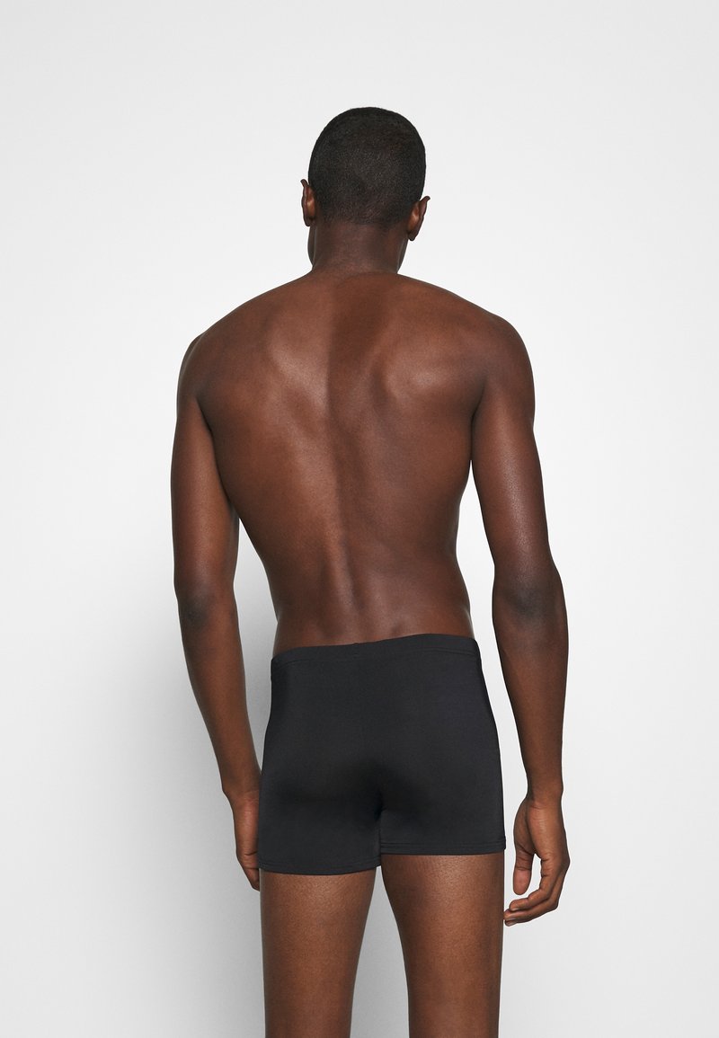 Puma CLASSIC SWIM TRUNK - Plavkové kalhotky - black