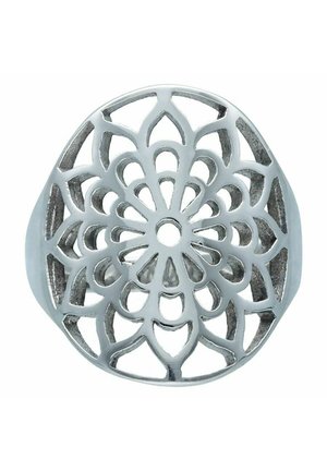 Silver openwork ring with symmetrical floral pattern featuring petal-shaped cutouts radiating from a central circle.