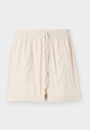 Beežid puuvillased lühikesed püksid elastse vöökoha, paelaga ja kahe küljerinnaga; omavad mugavat istuvust ja keritud äärt.