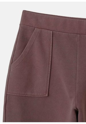 Mauve sweatpants featuring a smooth texture, a wide waistband, and two front pockets with subtle pleating details.