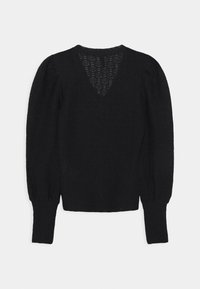 Pull noir à manches longues en maille avec motif texturé, taille cintrée, épaules bouffantes et détail en dentelle en forme de V dans le haut du dos.