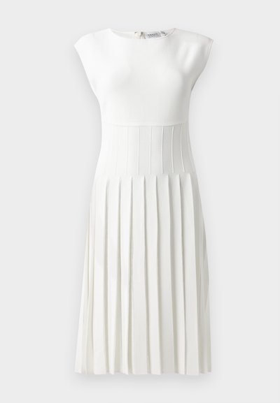 White pleated dress with a fitted top, cap sleeves, textured bodice, and a flared skirt. Zipper detail at back, smooth fabric finish.