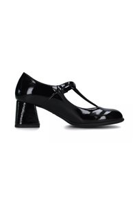 Tacco in vernice nera, design a T-strap, punta arrotondata, tacco a forma di blocco, texture liscia, finitura lucida.