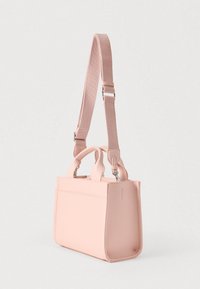 Pink synthetic handbag with a structured design, dual top handles, and a detachable adjustable strap. Smooth texture with minimal detailing.