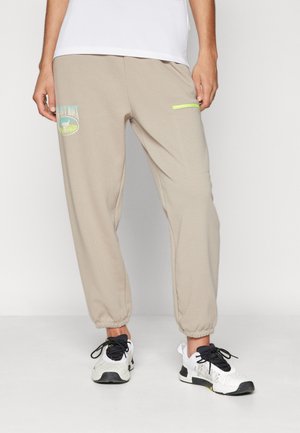 Under Armour TERRY PANT - Pantaloni sportivi - timberwolf taupe/radial turquoise