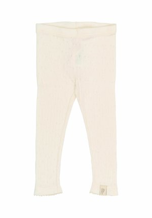 Białe dzianinowe legginsy z teksturowanym wzorem, z falbankowym dołem i małą metką z inicjałami przy kostce.