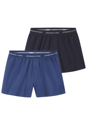 Boxer shorts para hombre en azul marino y azul real, con tejido suave, cinturilla elástica con la marca "Copenhagen Studios" y tapeta de botones.