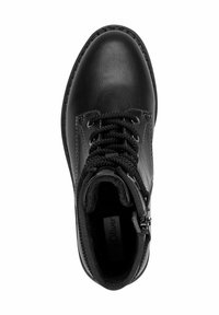 Bottines en cuir noir avec bout rond, devant à lacets et fermeture éclair sur le côté. Doublure douce visible à l'intérieur. Détails cousus le long des bords.