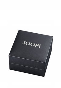 Schwarze strukturierte Box mit einer glatten Oberfläche, die das Logo "JOOP!" in Silber auf dem Deckel trägt. Quadratförmiges, minimalistisches Design.