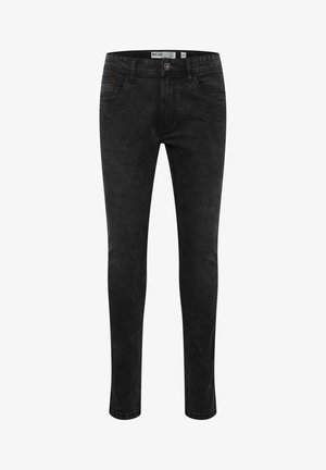 Czarne wąskie dżinsy o gładkiej teksturze, pięć kieszeni, subtelne detale szycia oraz standardowe zapięcie na guzik w talii.
