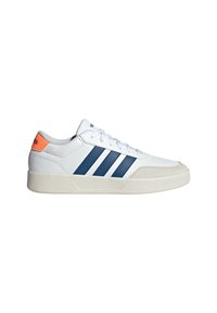 White sneaker with navy stripes, textured leather upper, round toe, and rubber sole. Features an orange accent on the heel and flat laces.