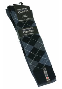Calze da uomo a ginocchio in blu scuro e nero, con un motivo argyle e cuciture bianche. Materiale etichettato come comodo senza fascia elastica.