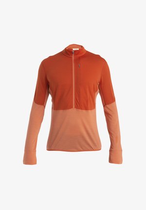 Langärmliges Shirt in Orangetönen mit Reißverschlusskragen, strukturiertem Stoff und Daumenlöchern für besseren Sitz und Komfort.