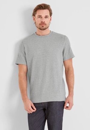 Gray cotton t-shirt with short sleeves, round neck, and a relaxed fit. The fabric has a smooth texture and minimal details.