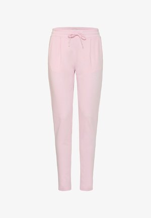 Svetlo roza trenirke z vrvico v pasu, z dvema stranskima žepoma in obliko ožjega hlačnika. Gladka tekstura in sproščen kroj.