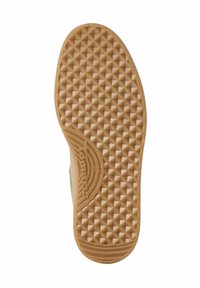 Tan rubber shoe sole with a textured surface featuring a diamond pattern. Includes branding details and a size marking.