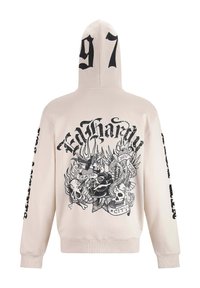Felpa beige con una grafica nera che presenta teschi e rose. Con cappuccio, tasca a canguro, maniche lunghe e polsini a costine.