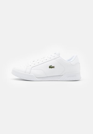 Weiße lacoste schuhe - Der Gewinner