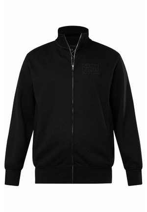 Zwarte zip-up jack met een hoge kraag, gestructureerde stof en reliëfletters op de linkerborst. Ribgebreide manchetten en zoom. Eenvoudig, strak ontwerp.