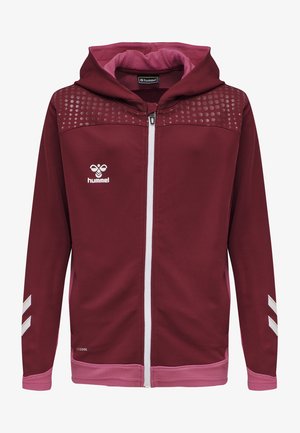 Bordeauxfärgad zip-up hoodie i strukturerad tyg. Har rosa detaljer, prickigt mönster på axlarna och vita randdetaljer på ärmarna.