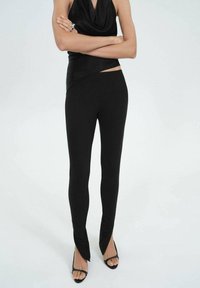 Mango ROMINE - Leggings - black