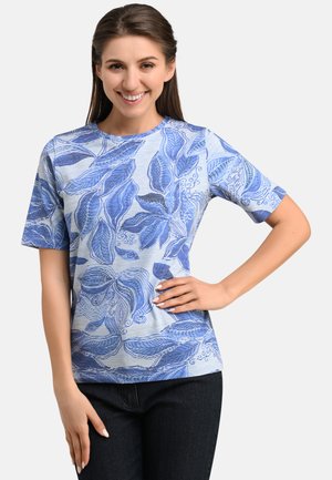 Blue short-sleeve t-shirt featuring a leaf pattern in varying shades of blue on a light blue background; soft fabric and relaxed fit.