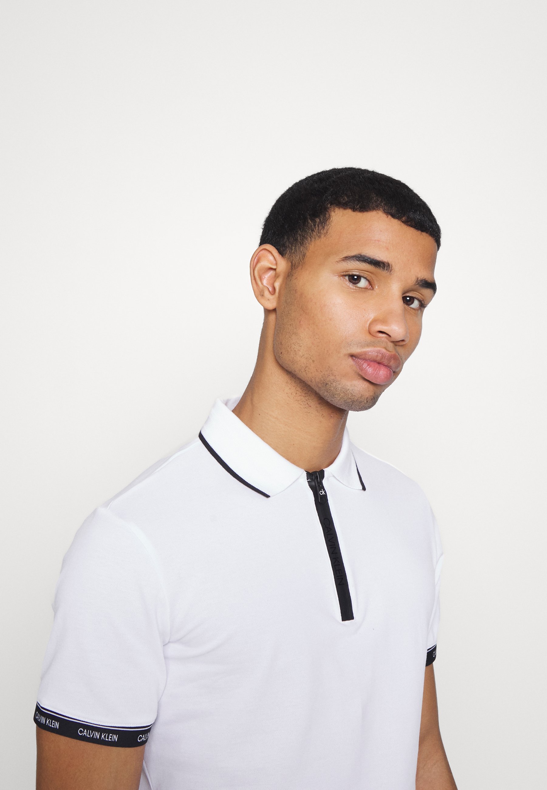 Calvin Klein BRANDED ZIPPER SLIM - Polo 