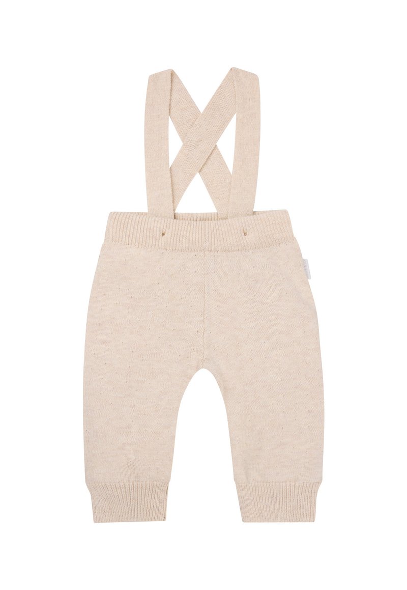 Beige gebreide overall met kruislingse schouderbanden, geribbelde taille en manchetten, met een subtiele stippenstructuur over de gehele stof.