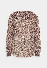 Blouse transparente avec un motif floral en noir, rose et blanc. Présente un col rond, des manches longues et un léger froncement à l'avant.
