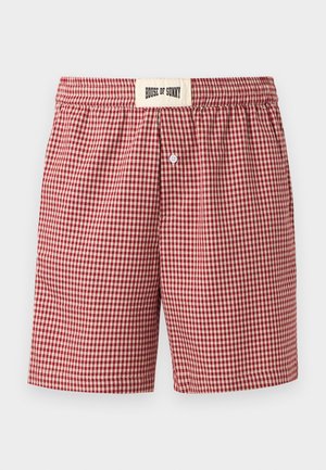 Pánske boxerky s elastickým pásom, stredovým zapínaním na gombík a štítkom "House of Sunny" na páse, v červeno-bielom károvanom vzore.