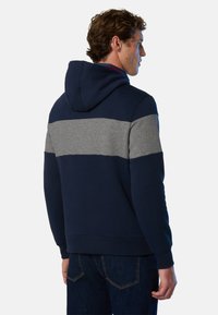 Sweat à capuche coloré en bleu marine et gris, en mélange de coton, avec une capuche, des poignets et une ceinture côtelés, au design décontracté.