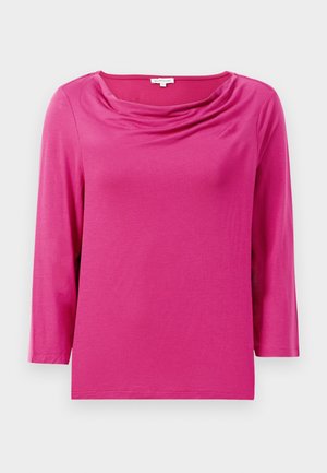 Haut fuchsia à manches longues avec un col drapé, texture lisse et ourlet droit. Fabriqué en tissu léger et stretch.